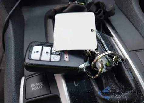 2017 Honda Civic Touring z USA, uszkodzony, nr VIN 2HGFC1F97HH654564